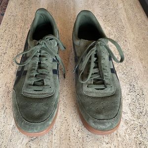 ASICS men’s green suede shoes.